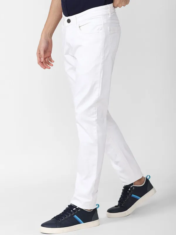 White_Mid_Rise_Cotton_Blend_Slim_Jeans_For_Men