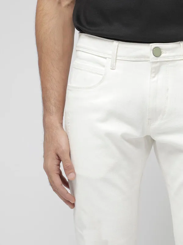 White_Cotton_Blend_Slim_Mid_Rise_Jeans_For_Men
