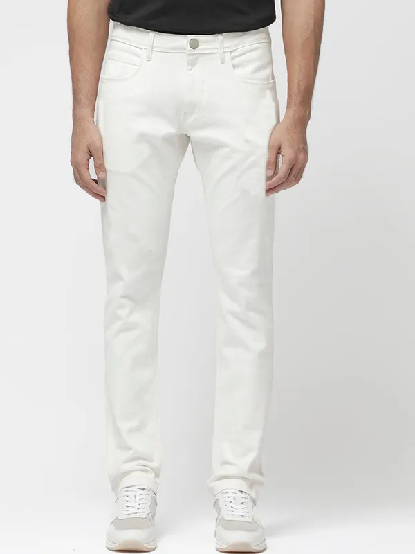 White_Cotton_Blend_Slim_Mid_Rise_Jeans_For_Men