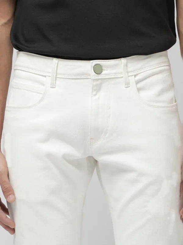 White_Cotton_Blend_Slim_Mid_Rise_Jeans_For_Men