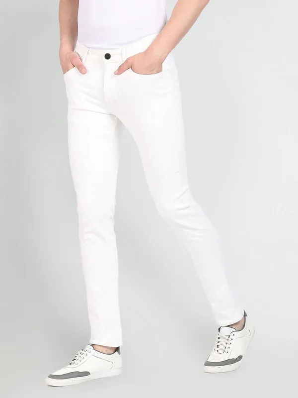 White_Cotton_Blend_Slim_Mid_Rise_Jeans_For_Men