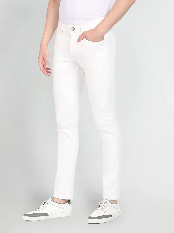 White_Cotton_Blend_Slim_Mid_Rise_Jeans_For_Men