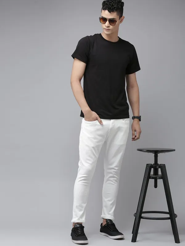 White_Cotton_Blend_Slim_Mid_Rise_Jeans_For_Men