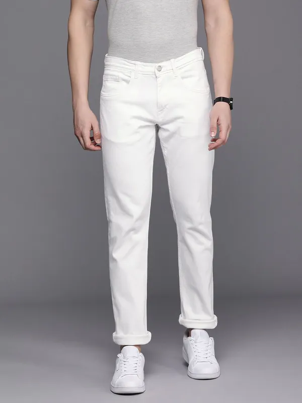 White_Cotton_Blend_Slim_Mid_Rise_Jeans_For_Men