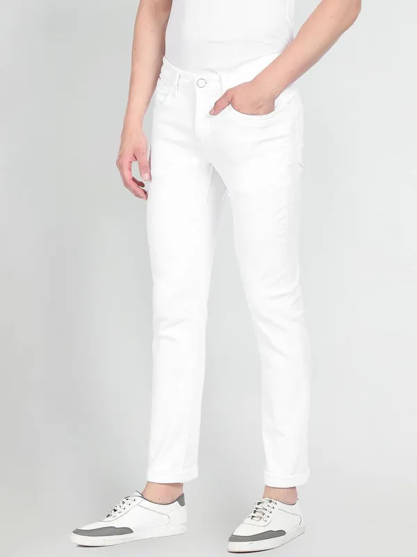 White_Cotton_Blend_Slim_Mid_Rise_Jeans_For_Men