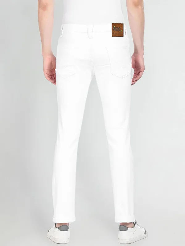 White_Cotton_Blend_Slim_Mid_Rise_Jeans_For_Men