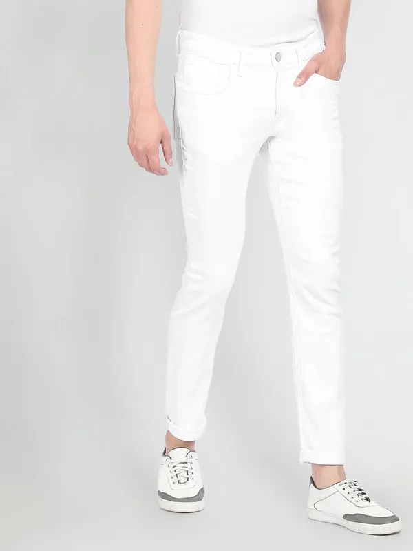 White_Cotton_Blend_Slim_Mid_Rise_Jeans_For_Men