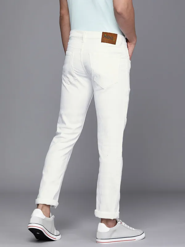 White_Mid_Rise_Cotton_Blend_Slim_Jeans_For_Men