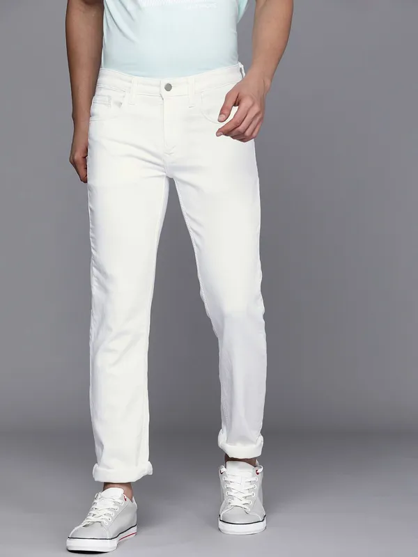 White_Mid_Rise_Cotton_Blend_Slim_Jeans_For_Men
