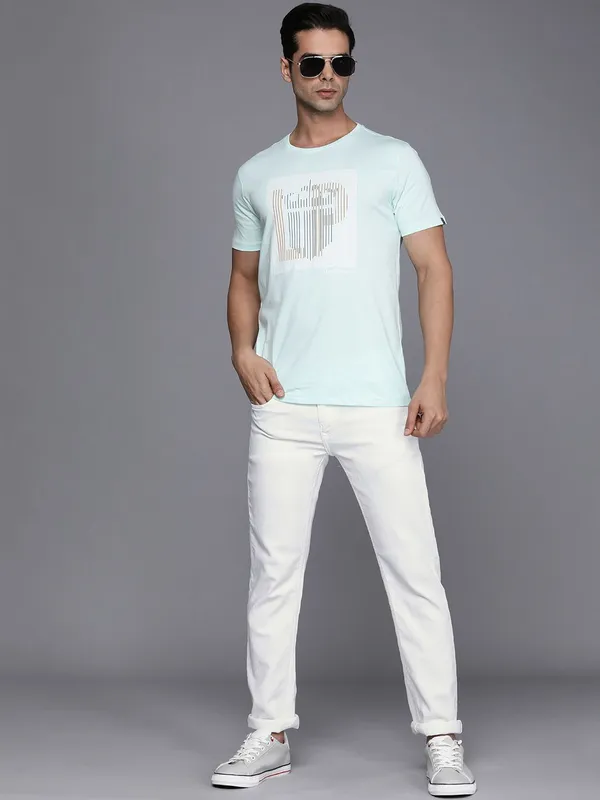 White_Mid_Rise_Cotton_Blend_Slim_Jeans_For_Men