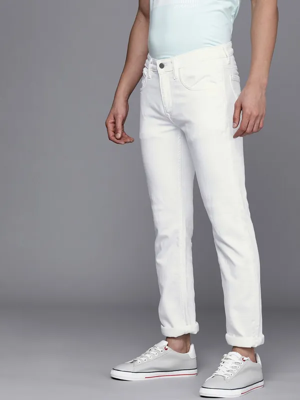 White_Mid_Rise_Cotton_Blend_Slim_Jeans_For_Men