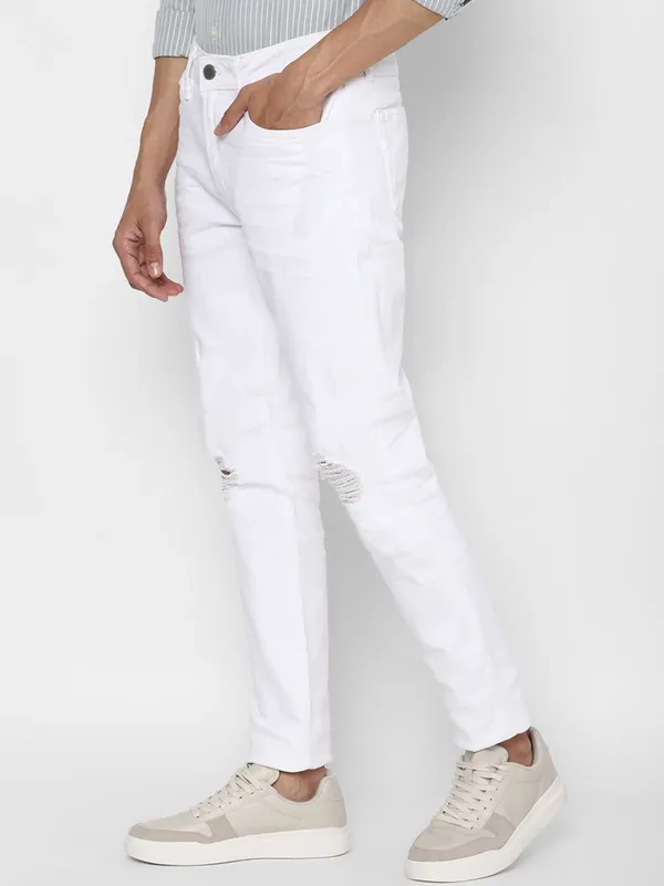 White_Cotton_Blend_Slim_Mid_Rise_Jeans_For_Men