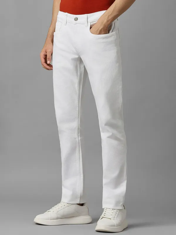 White_Cotton_Blend_Slim_Mid_Rise_Jeans_For_Men