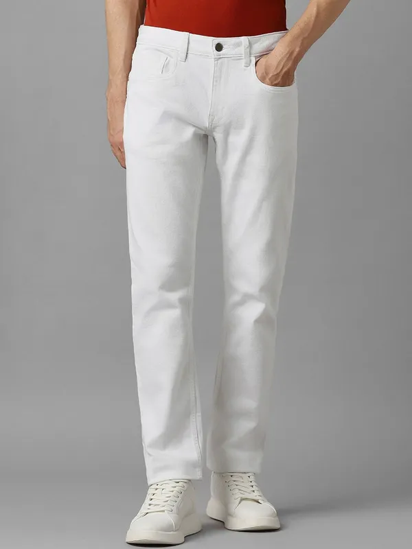 White_Cotton_Blend_Slim_Mid_Rise_Jeans_For_Men