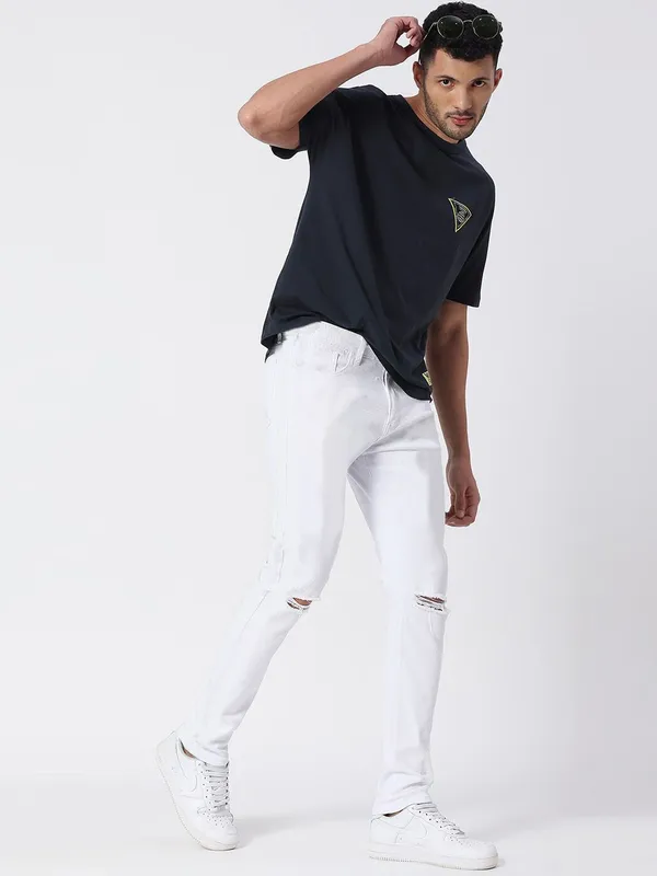 White_Mid_Rise_Cotton_Blend_Slim_Jeans_For_Men