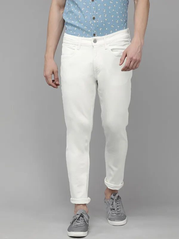 White_Cotton_Blend_Slim_Mid_Rise_Jeans_For_Men