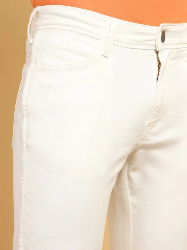 White_Cotton_Blend_Slim_Mid_Rise_Jeans_For_Men