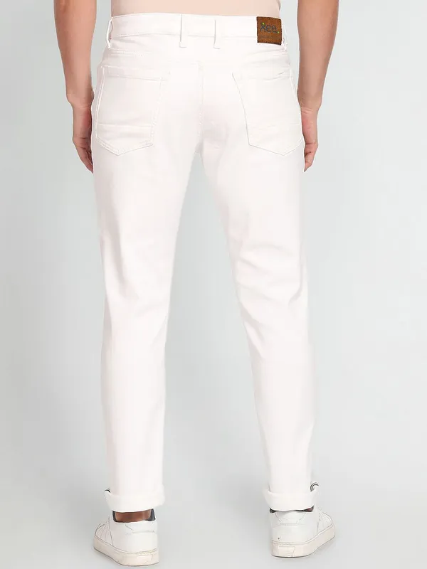 White_Mid_Rise_Cotton_Blend_Slim_Jeans_For_Men
