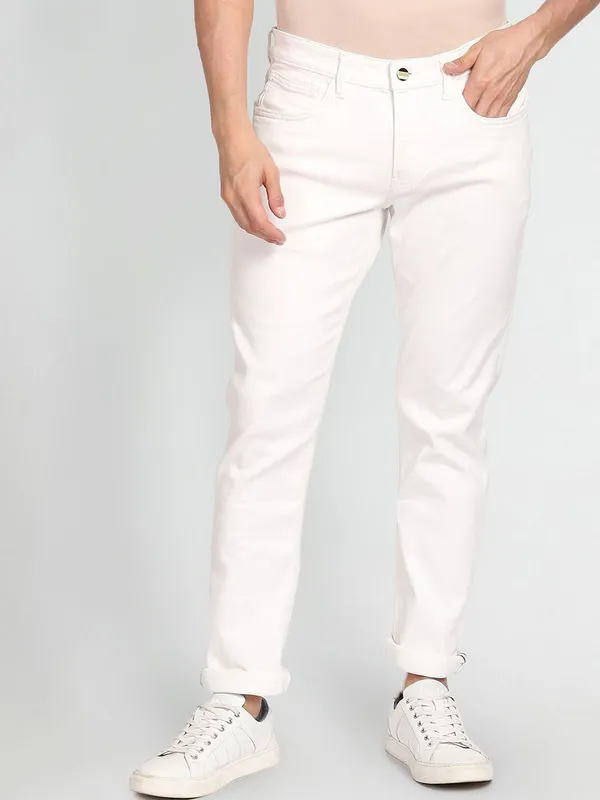 White_Mid_Rise_Cotton_Blend_Slim_Jeans_For_Men