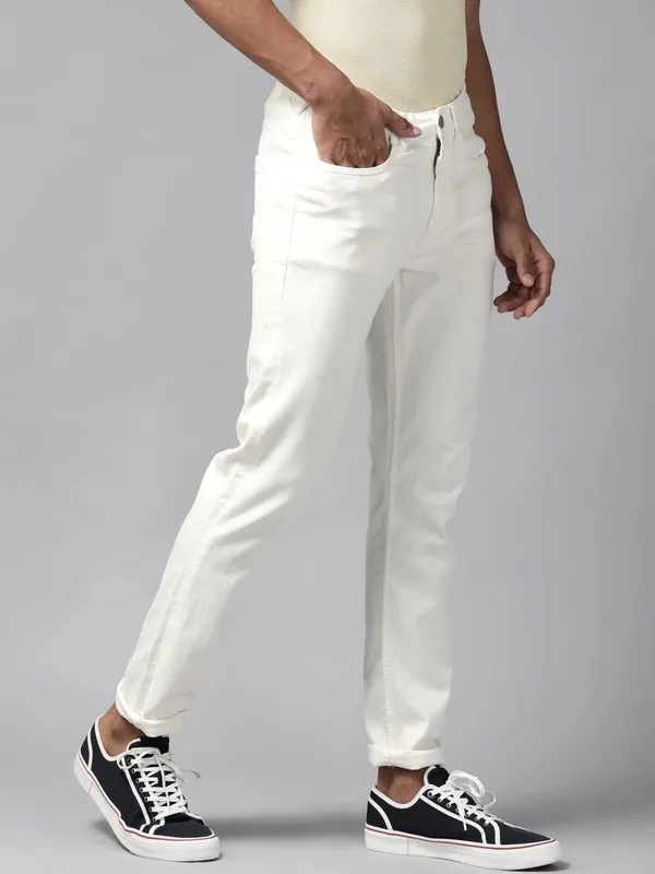 White_Mid_Rise_Cotton_Blend_Slim_Jeans_For_Men