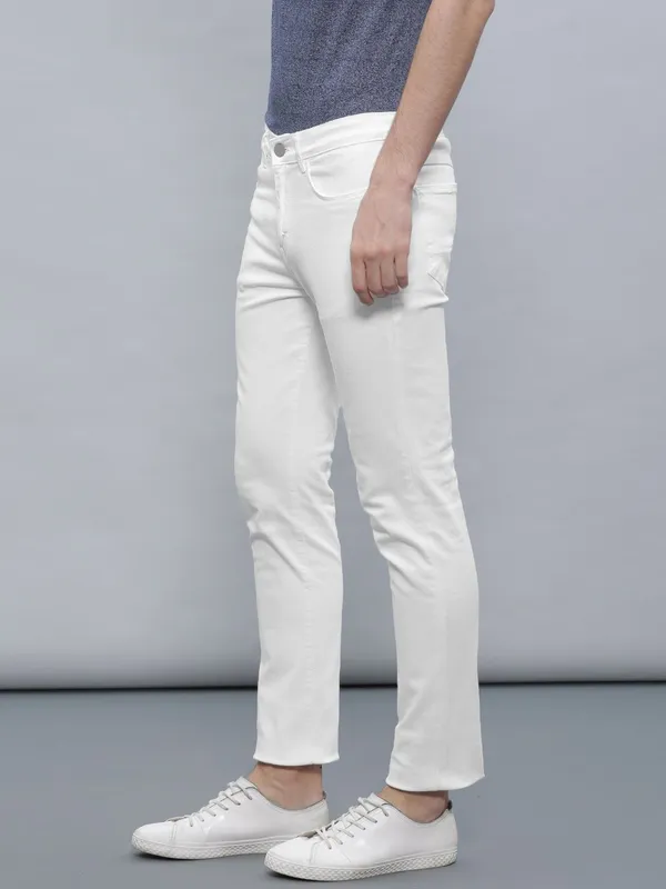White_Cotton_Blend_Slim_Mid_Rise_Jeans_For_Men
