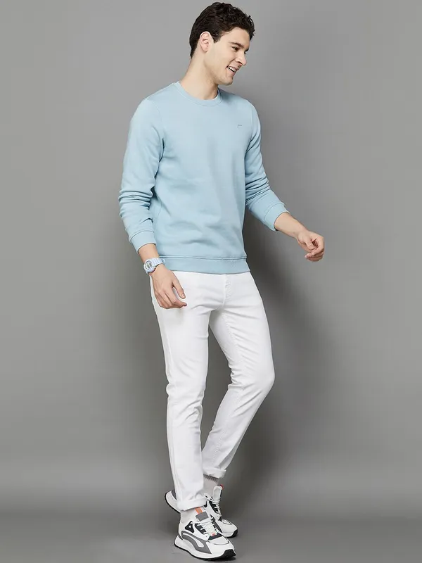 White_Cotton_Blend_Slim_Mid_Rise_Jeans_For_Men