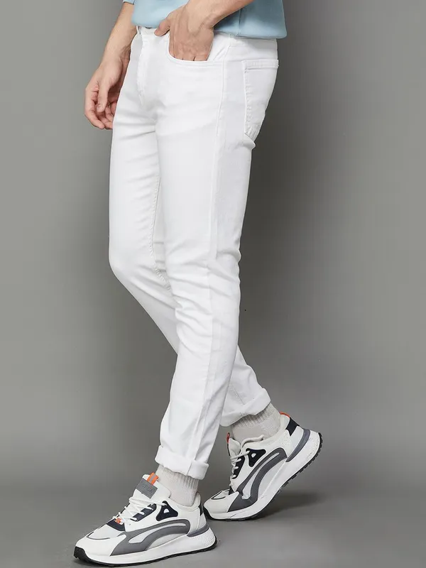 White_Cotton_Blend_Slim_Mid_Rise_Jeans_For_Men