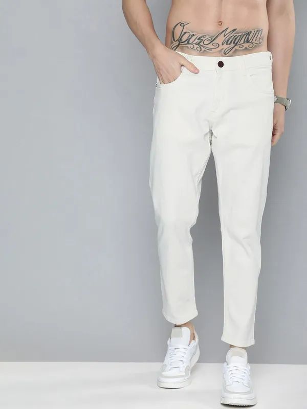 White_Cotton_Blend_Slim_Mid_Rise_Jeans_For_Men