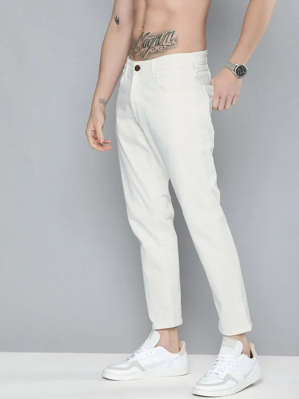 White_Cotton_Blend_Slim_Mid_Rise_Jeans_For_Men