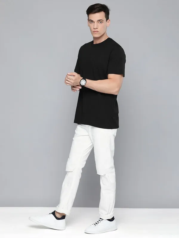 White_Cotton_Blend_Slim_Mid_Rise_Jeans_For_Men