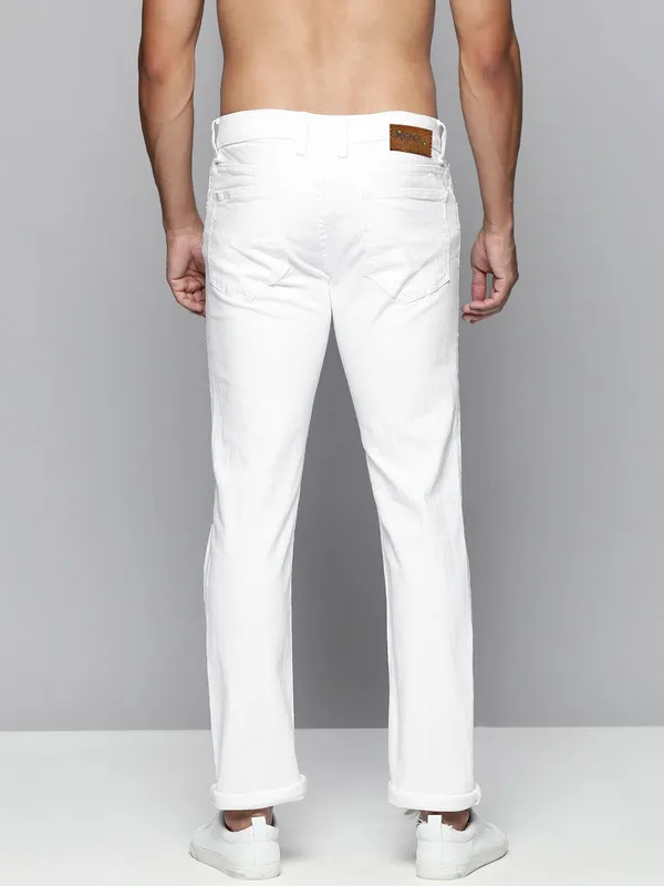 White_Cotton_Blend_Slim_Mid_Rise_Jeans_For_Men