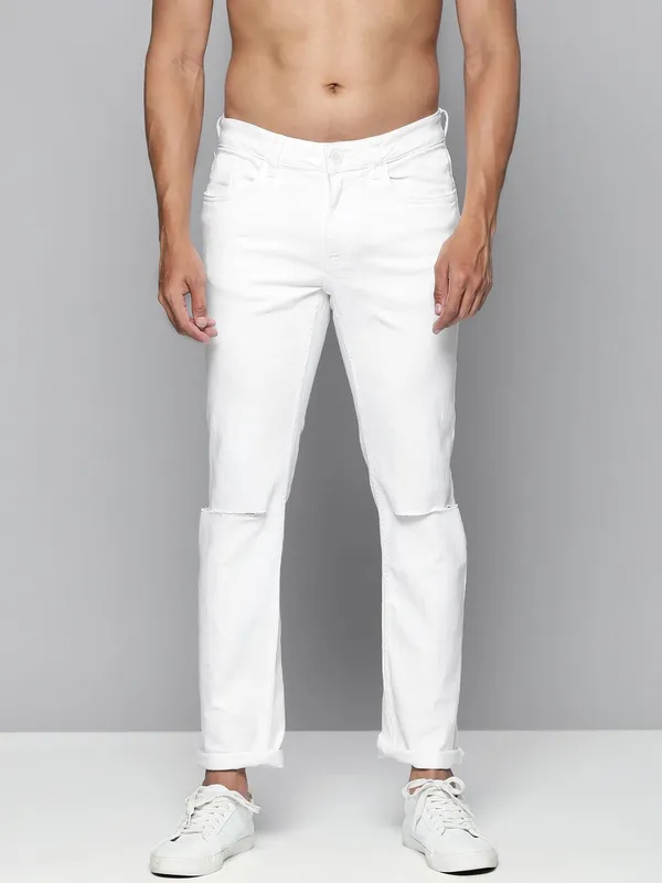 White_Cotton_Blend_Slim_Mid_Rise_Jeans_For_Men