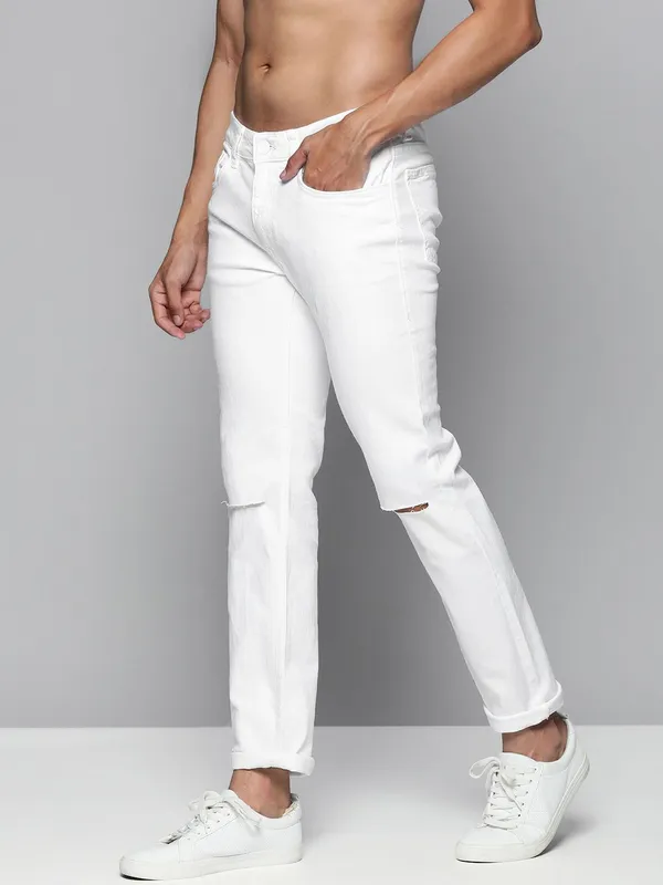 White_Cotton_Blend_Slim_Mid_Rise_Jeans_For_Men