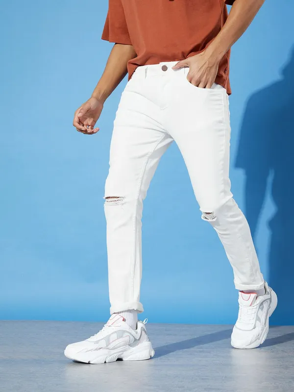 White_Cotton_Blend_Slim_Mid_Rise_Jeans_For_Men
