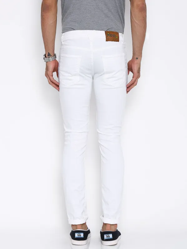 White_Cotton_Blend_Slim_Mid_Rise_Jeans_For_Men