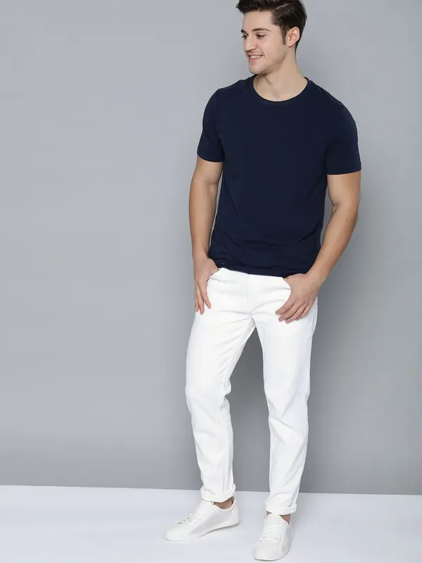 White_Cotton_Blend_Slim_Mid_Rise_Jeans_For_Men