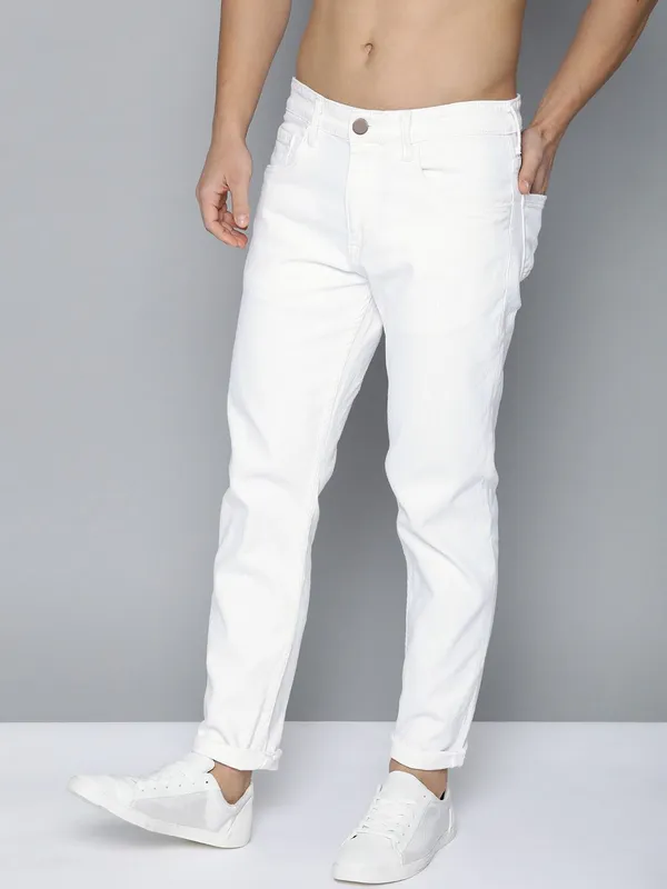 White_Cotton_Blend_Slim_Mid_Rise_Jeans_For_Men