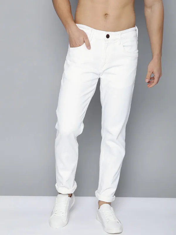 White_Cotton_Blend_Slim_Mid_Rise_Jeans_For_Men