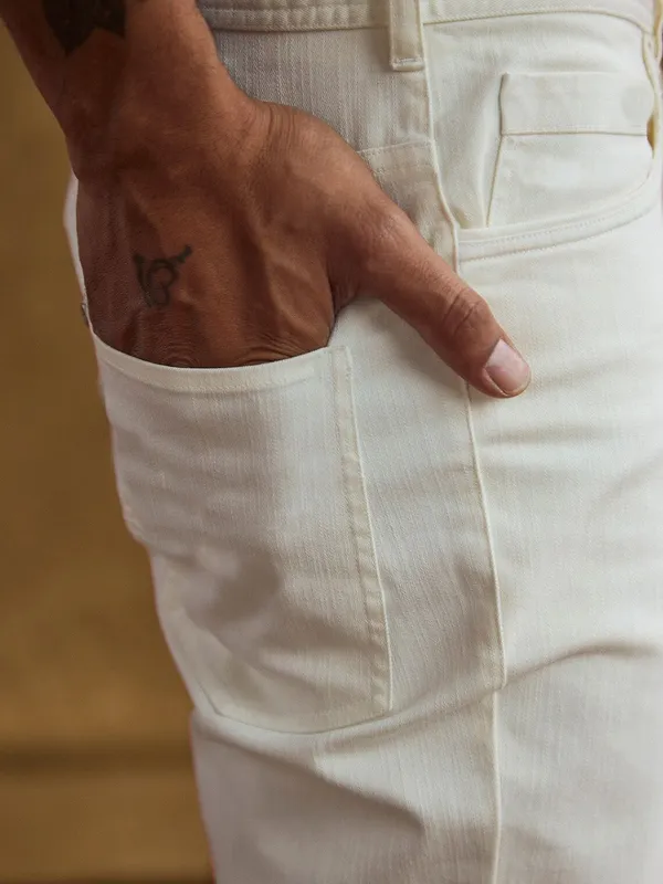 White_Cotton_Blend_Slim_Mid_Rise_Jeans_For_Men