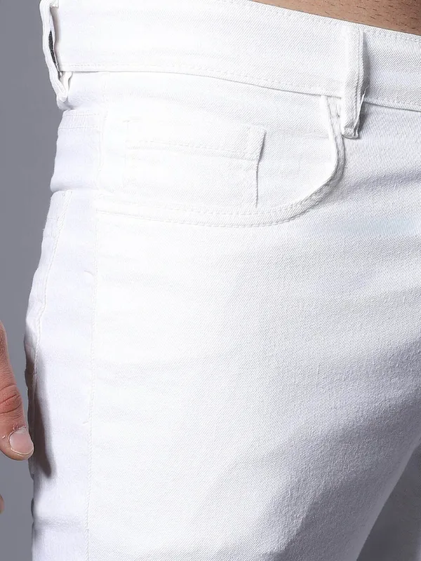 White_Cotton_Blend_Slim_Mid_Rise_Jeans_For_Men