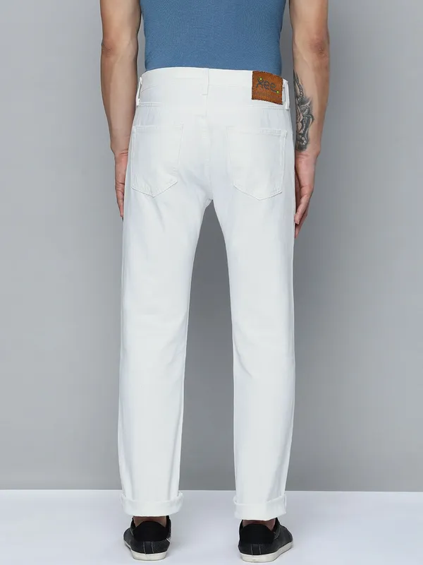 White_Cotton_Blend_Slim_Mid_Rise_Jeans_For_Men