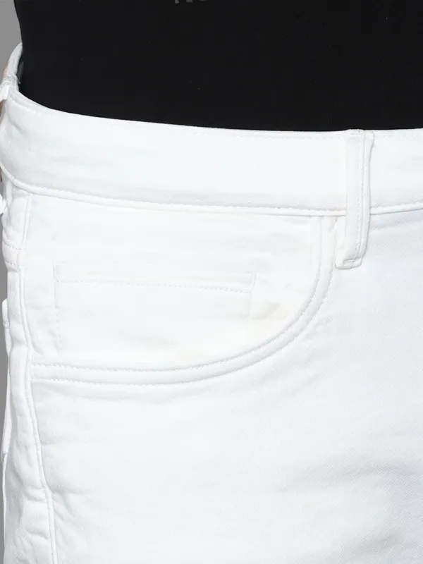 White_Cotton_Blend_Slim_Mid_Rise_Jeans_For_Men