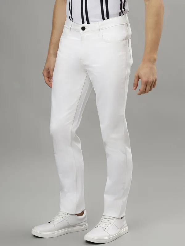 White_Cotton_Blend_Slim_Mid_Rise_Jeans_For_Men