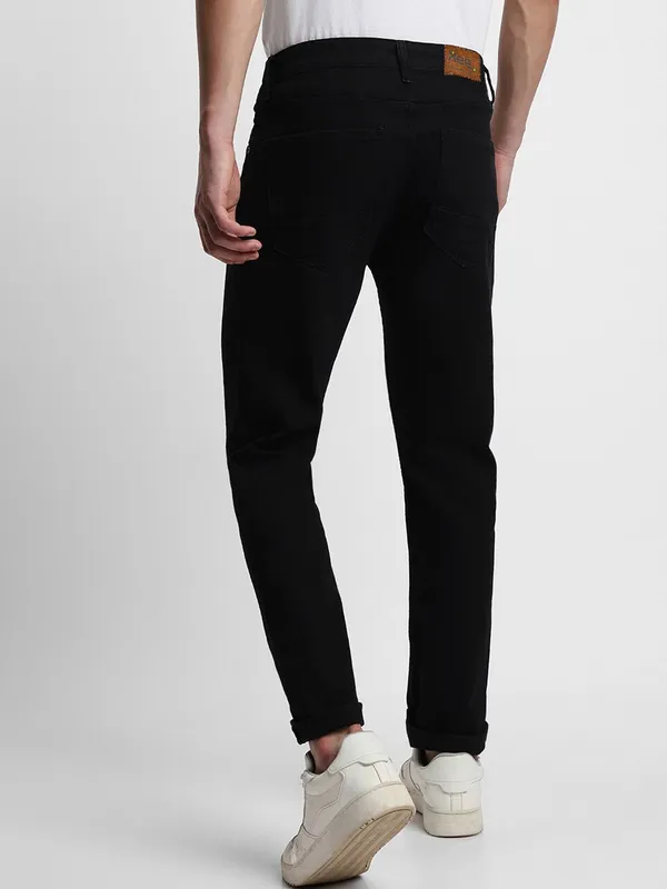 Black_Cotton_Blend_Jogger_Fit_Mid_Rise_Jeans_For_Men