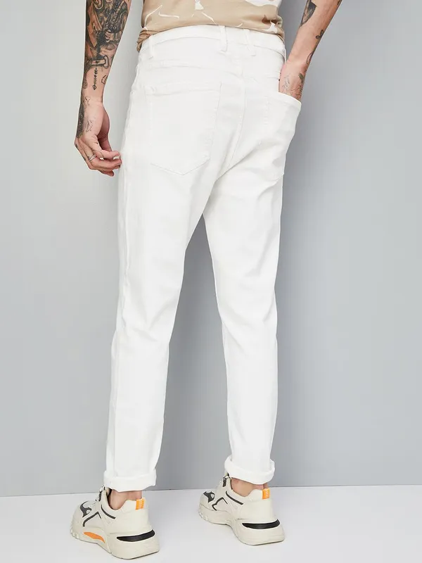 White_Mid_Rise_Cotton_Blend_Slim_Jeans_For_Men
