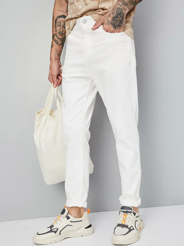 White_Mid_Rise_Cotton_Blend_Slim_Jeans_For_Men