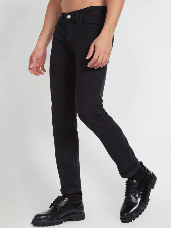Black_Cotton_Blend_Slim_Mid_Rise_Jeans_For_Men