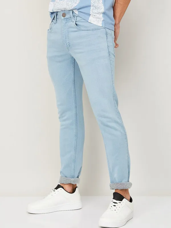 Blue_Cotton_Blend_Slim_Mid_Rise_Jeans_For_Men