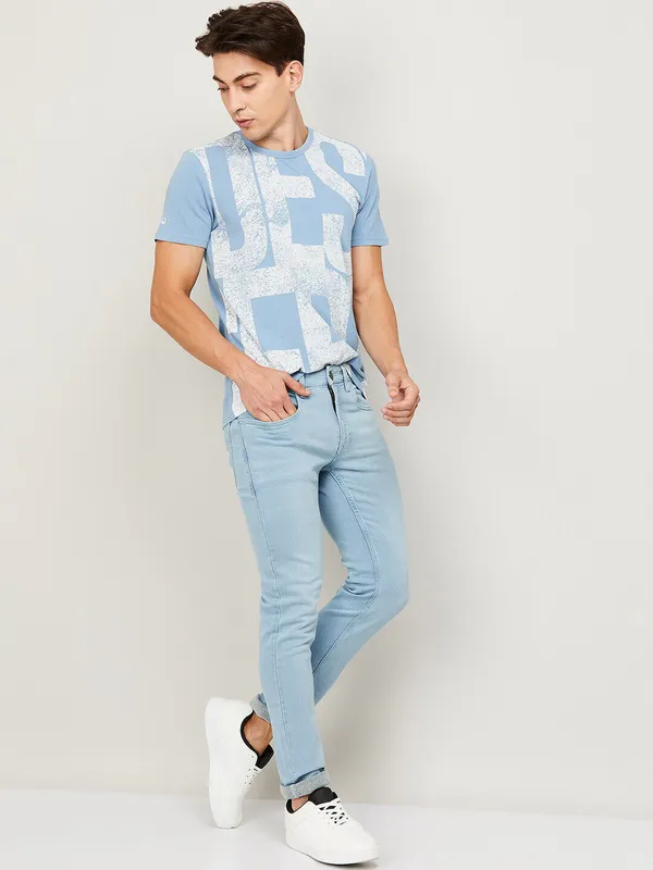 Blue_Cotton_Blend_Slim_Mid_Rise_Jeans_For_Men