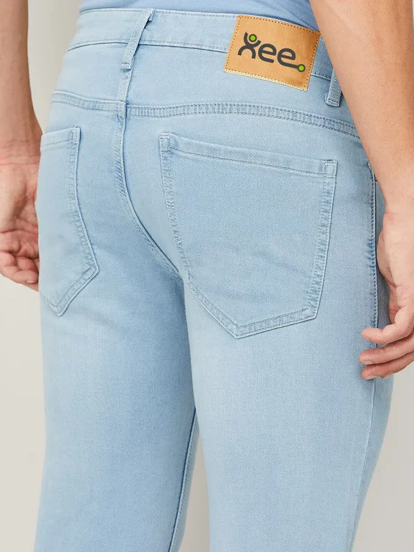 Blue_Cotton_Blend_Slim_Mid_Rise_Jeans_For_Men